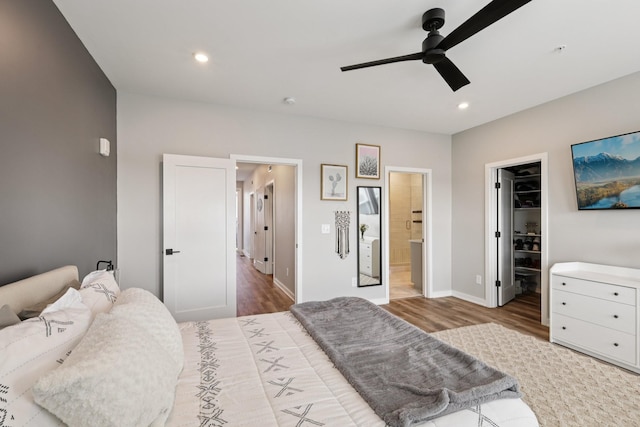 2006 Edison Park Ln, Nashville, TN 37209 - bedroom with a spacious closet, wood finished floors, ensuite bathroom, recessed lighting, and a ceiling fan