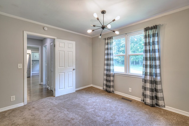 1213 N Graycroft Ave, Madison, TN 37115 - carpeted empty room featuring a chandelier, crown molding, and a smoke detector