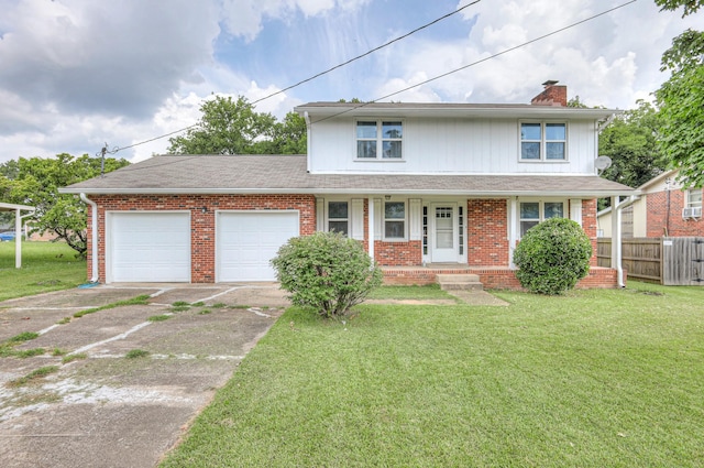 1213 N Graycroft Ave, Madison, TN 37115 - traditional-style house featuring a garage, driveway, brick siding, a chimney, and covered porch