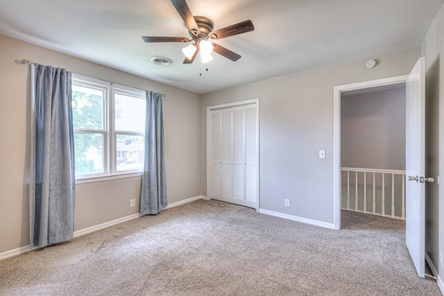 1213 N Graycroft Ave, Madison, TN 37115 - unfurnished bedroom featuring carpet, a closet, and a ceiling fan