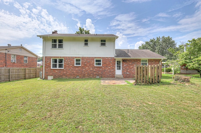 1213 N Graycroft Ave, Madison, TN 37115 - back of house with a patio, brick siding, and a chimney