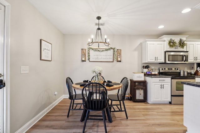 1319 Knoll Ln, Lebanon, TN 37087 - dining area with recessed lighting, light wood finished floors, and a chandelier
