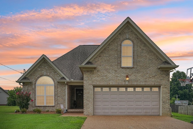 1319 Knoll Ln, Lebanon, TN 37087 - traditional-style house featuring driveway, brick siding, and a shingled roof