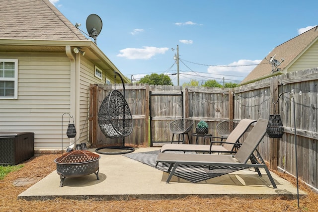 1319 Knoll Ln, Lebanon, TN 37087 - fenced backyard with a fire pit and a patio area