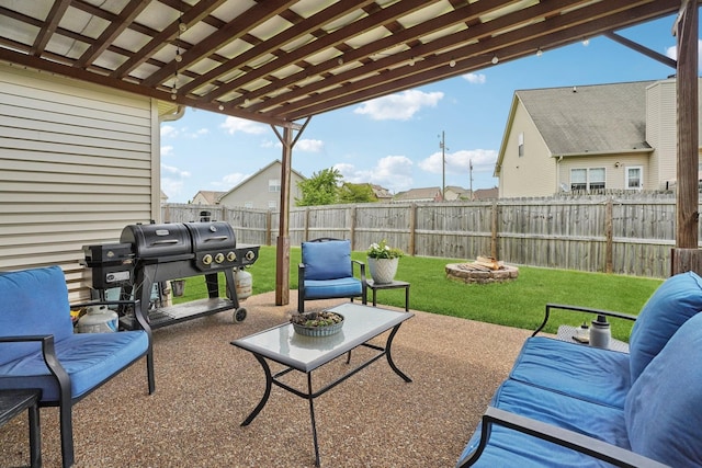 1319 Knoll Ln, Lebanon, TN 37087 - fenced backyard featuring a grill, a patio area, and a fire pit