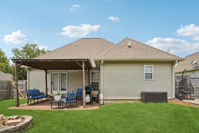 1319 Knoll Ln, Lebanon, TN 37087 - back of house with a shingled roof, a fenced backyard, a patio area, and an outdoor living space