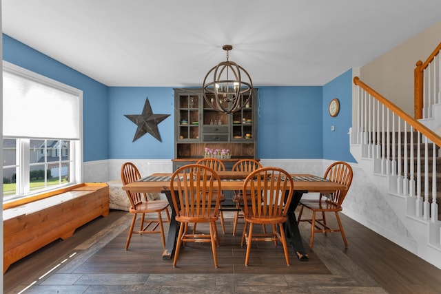 2105 Burgess Ln, Spring Hill, TN 37174 - dining space with wainscoting, stairway, a chandelier, and wood finished floors