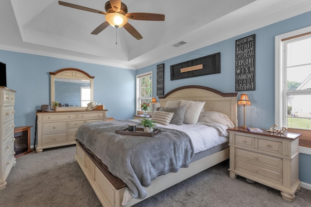 2105 Burgess Ln, Spring Hill, TN 37174 - bedroom featuring a raised ceiling, light colored carpet, a ceiling fan, and ornamental molding