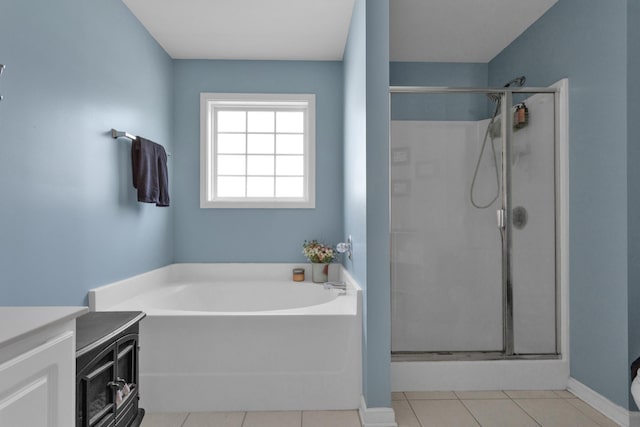 2105 Burgess Ln, Spring Hill, TN 37174 - full bathroom featuring a garden tub, a stall shower, vanity, and tile patterned flooring