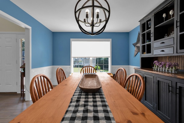 2105 Burgess Ln, Spring Hill, TN 37174 - dining space with a chandelier, a wainscoted wall, and wood finished floors