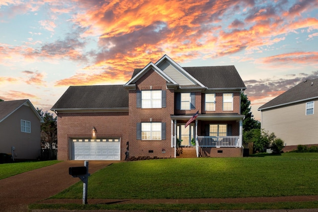 2105 Burgess Ln, Spring Hill, TN 37174 - view of front of property featuring a porch, a front yard, driveway, brick siding, and crawl space