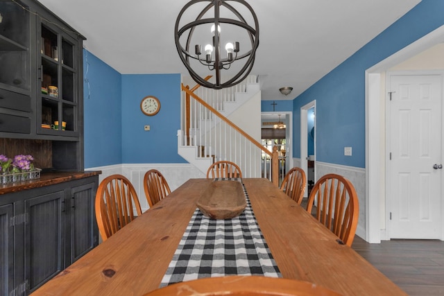2105 Burgess Ln, Spring Hill, TN 37174 - dining space with a chandelier, wainscoting, stairway, and wood finished floors