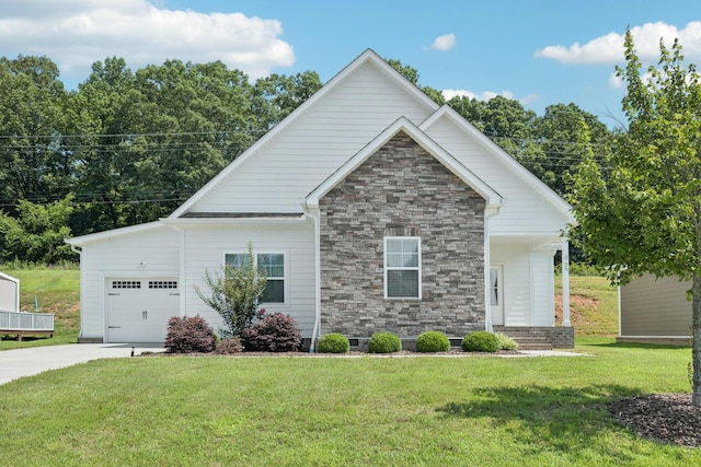 26 Sycamore Rdg W, Burns, TN 37029 - view of front facade with a front lawn, a garage, driveway, and stone siding