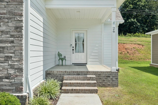 26 Sycamore Rdg W, Burns, TN 37029 - property entrance featuring a lawn