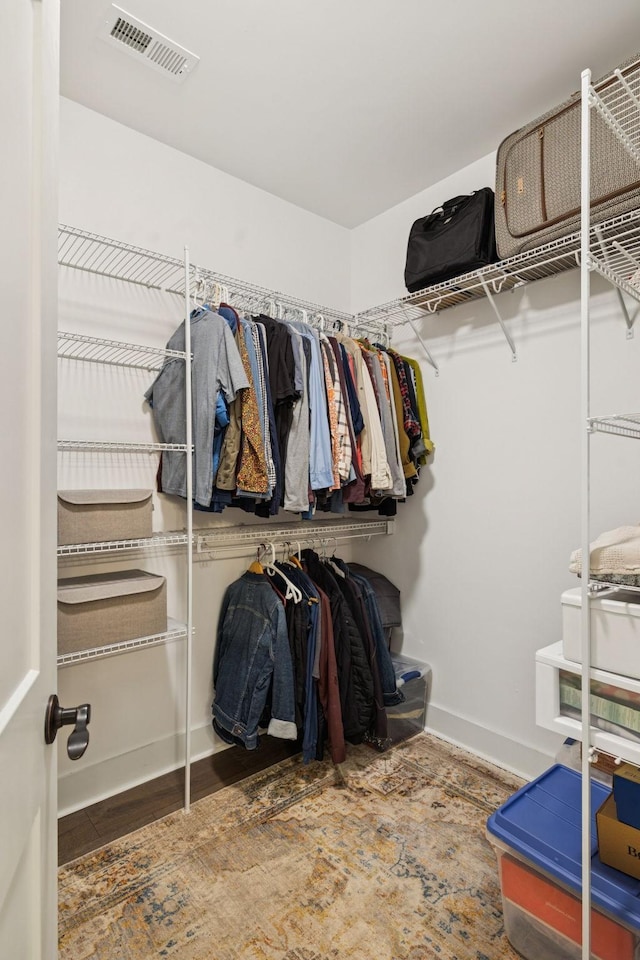 26 Sycamore Rdg W, Burns, TN 37029 - walk in closet with wood finished floors