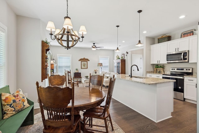 26 Sycamore Rdg W, Burns, TN 37029 - dining area with a ceiling fan, dark wood finished floors, a chandelier, and recessed lighting