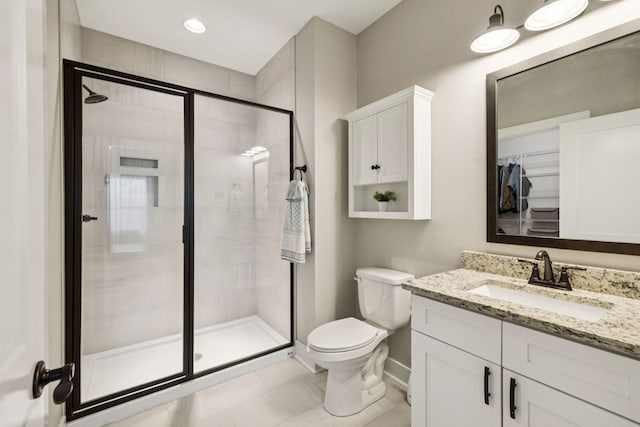 26 Sycamore Rdg W, Burns, TN 37029 - full bathroom with vanity, a shower stall, and a spacious closet