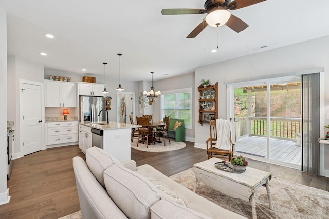 26 Sycamore Rdg W, Burns, TN 37029 - living room featuring dark wood-style flooring, recessed lighting, a chandelier, and ceiling fan