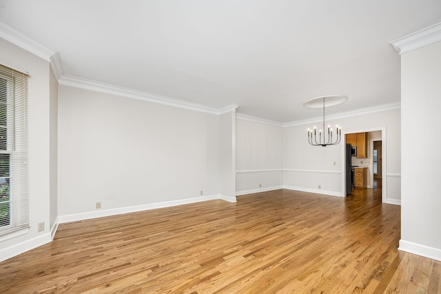 1436 Cheshire Pl, Murfreesboro, TN 37129 - empty room with a chandelier, ornamental molding, and light wood finished floors