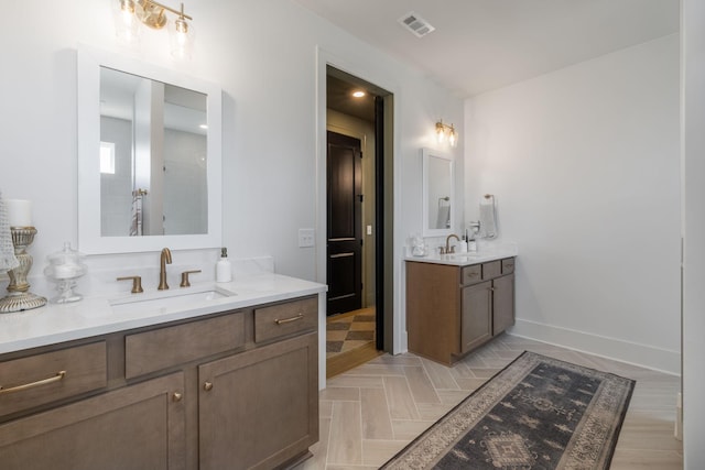 5831 Branta Dr, Franklin, TN 37064 - full bath featuring two vanities and baseboards