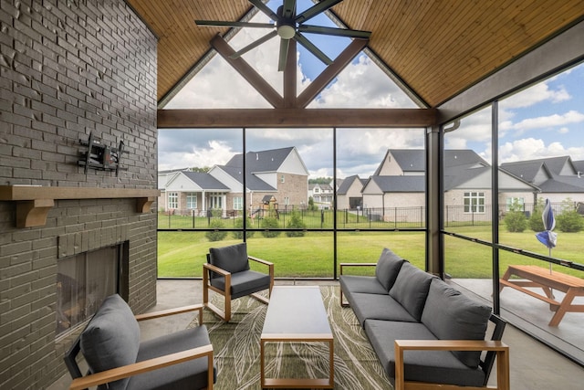 5831 Branta Dr, Franklin, TN 37064 - sunroom with a residential view, ceiling fan, an outdoor living space with a fireplace, lofted ceiling, and plenty of natural light