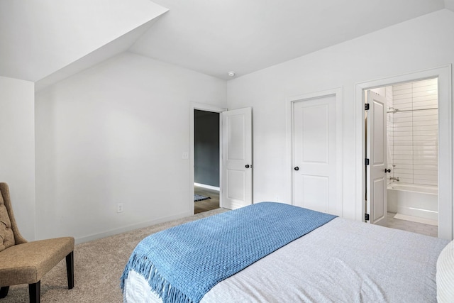 5831 Branta Dr, Franklin, TN 37064 - carpeted bedroom featuring vaulted ceiling and connected bathroom