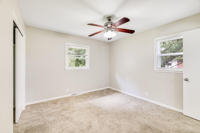 2010 Olympia Pl, Murfreesboro, TN 37130 - unfurnished bedroom with carpet flooring, a closet, and a ceiling fan