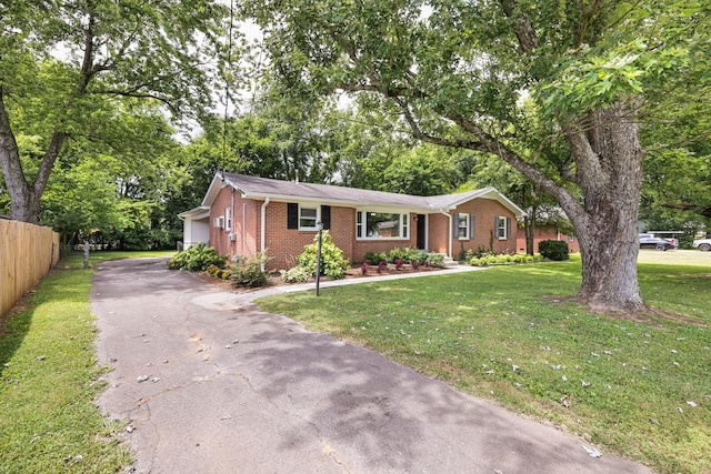 2010 Olympia Pl, Murfreesboro, TN 37130 - ranch-style home featuring asphalt driveway and brick siding
