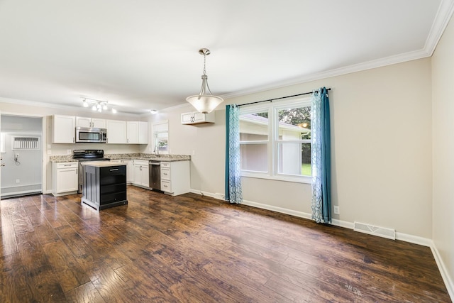 2010 Olympia Pl, Murfreesboro, TN 37130 - kitchen featuring appliances with stainless steel finishes, ornamental molding, white cabinetry, dark wood-style floors, and pendant lighting