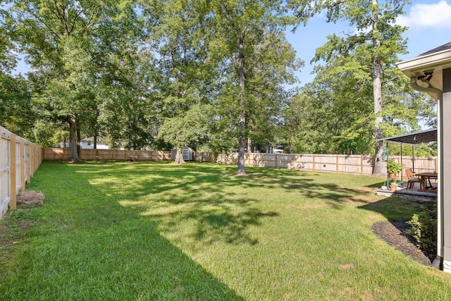 8408 Morin Rd, Chattanooga, TN 37421 - fenced backyard with a storage shed and a patio