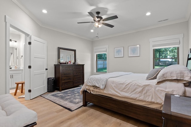 8408 Morin Rd, Chattanooga, TN 37421 - bedroom featuring light wood-type flooring, multiple windows, recessed lighting, ornamental molding, and ensuite bathroom