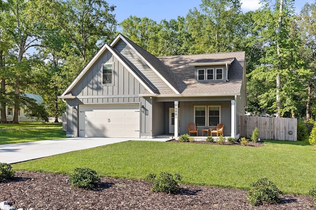 8408 Morin Rd, Chattanooga, TN 37421 - view of front facade with a porch, concrete driveway, a shingled roof, board and batten siding, and a garage
