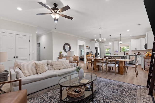 8408 Morin Rd, Chattanooga, TN 37421 - living area featuring ornamental molding, light wood-style floors, a ceiling fan, and recessed lighting