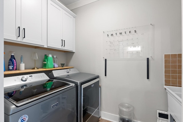 8408 Morin Rd, Chattanooga, TN 37421 - washroom featuring washing machine and clothes dryer and cabinet space
