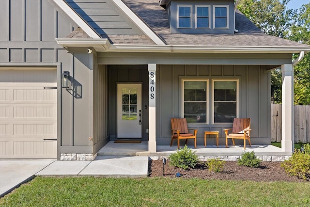 8408 Morin Rd, Chattanooga, TN 37421 - entrance to property featuring covered porch, a shingled roof, and board and batten siding
