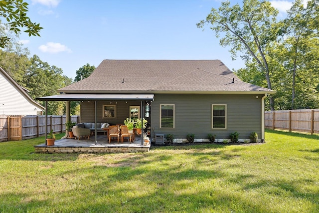 8408 Morin Rd, Chattanooga, TN 37421 - rear view of house with outdoor lounge area, a fenced backyard, a shingled roof, and a patio area