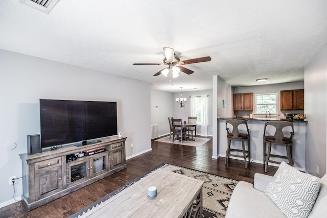 112 Ray Ave, Old Hickory, TN 37138 - living room with a ceiling fan, dark wood-style flooring, and a chandelier