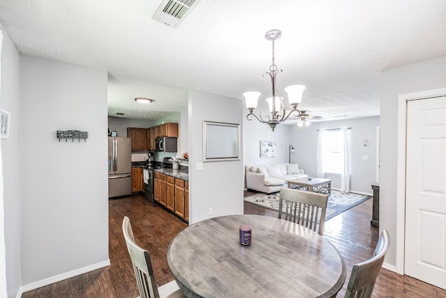112 Ray Ave, Old Hickory, TN 37138 - dining space with dark wood-style flooring and a chandelier