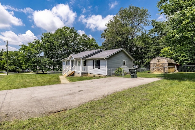112 Ray Ave, Old Hickory, TN 37138 - view of front of property with crawl space, driveway, and a storage shed