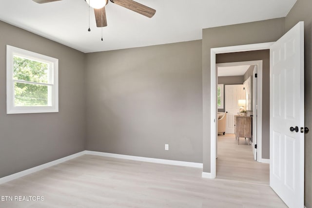 588 Meadowbrook Dr, Mcminnville, TN 37110 - unfurnished room with light wood finished floors and ceiling fan