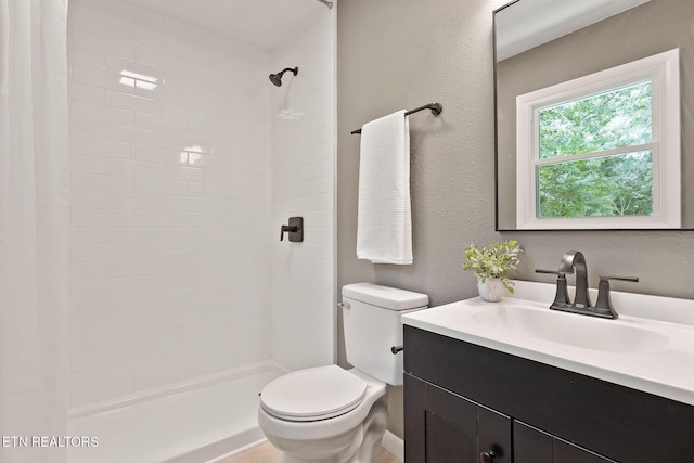 588 Meadowbrook Dr, Mcminnville, TN 37110 - full bath featuring vanity, a tile shower, and a textured wall