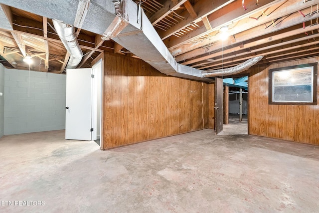588 Meadowbrook Dr, Mcminnville, TN 37110 - unfinished basement featuring wood walls and concrete block wall