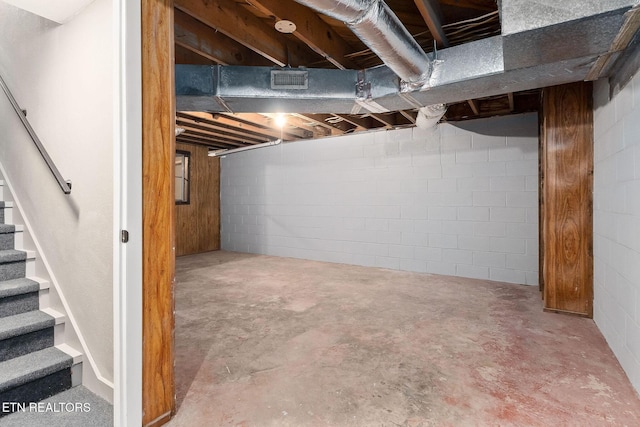 588 Meadowbrook Dr, Mcminnville, TN 37110 - unfinished basement featuring stairway and concrete block wall