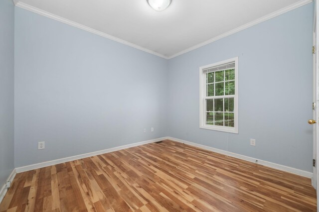 1324 Mockingbird Ln, Murfreesboro, TN 37130 - unfurnished room featuring wood finished floors and ornamental molding