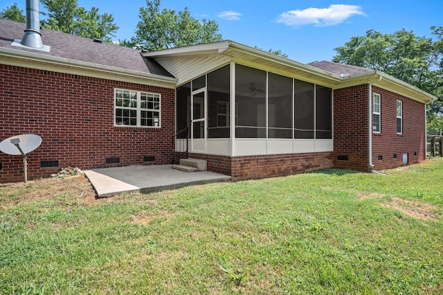 1324 Mockingbird Ln, Murfreesboro, TN 37130 - back of house featuring crawl space, a sunroom, a patio area, a lawn, and brick siding