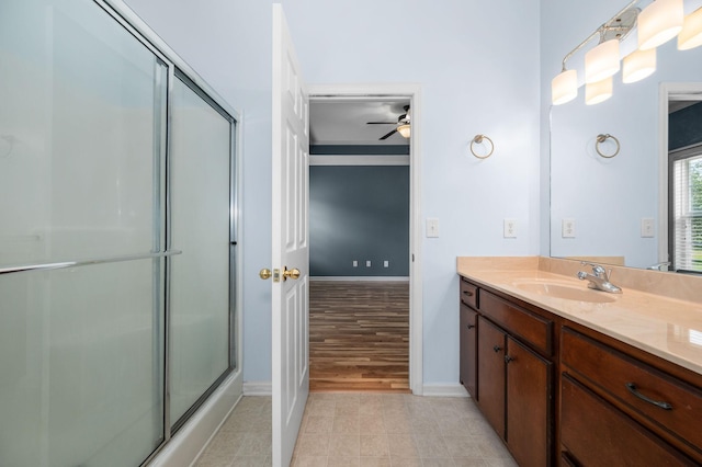 1324 Mockingbird Ln, Murfreesboro, TN 37130 - full bathroom with an enclosed shower, vanity, and ceiling fan