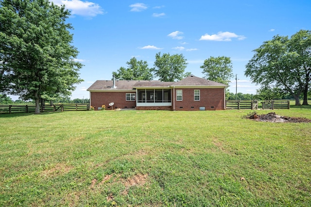 1324 Mockingbird Ln, Murfreesboro, TN 37130 - back of property featuring crawl space, a sunroom, brick siding, and a fenced backyard