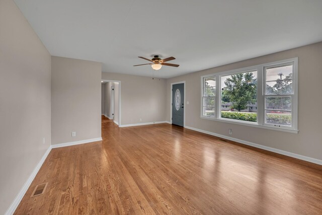 909 Woods Lake Dr, Madison, TN 37115 - unfurnished room featuring light wood-style floors and ceiling fan