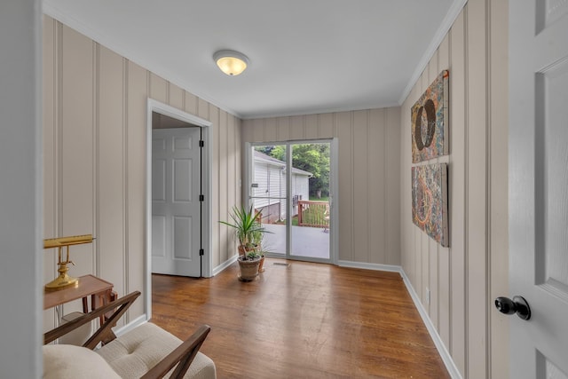 909 Woods Lake Dr, Madison, TN 37115 - living area with a decorative wall, ornamental molding, and wood finished floors