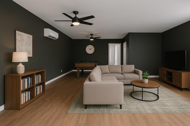 909 Woods Lake Dr, Madison, TN 37115 - living room featuring a wall mounted AC, wood finished floors, pool table, and ceiling fan